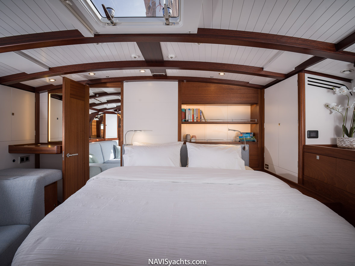 The stunning interiors of Spirit Yachts, showcasing artisan joinery, cabinetry, and carpentry in matched grain wood