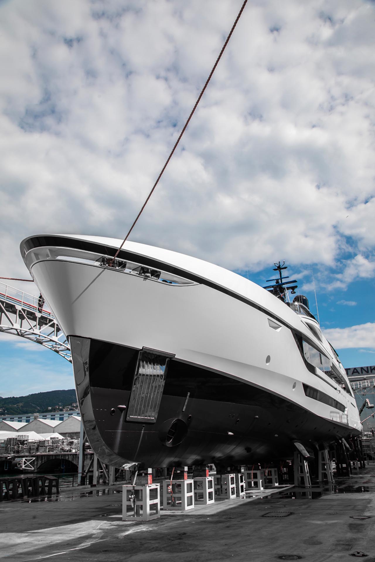 Luxurious interior of the Tankoa 55 C115 superyacht, highlighting the spacious design and floor-to-ceiling windows envisioned by Luca Dini Design & Architecture