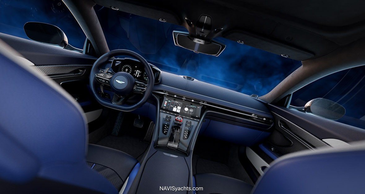 Aston Martin DB12 interior with driver-focused screen, physical controls, and knurled drive-mode dial