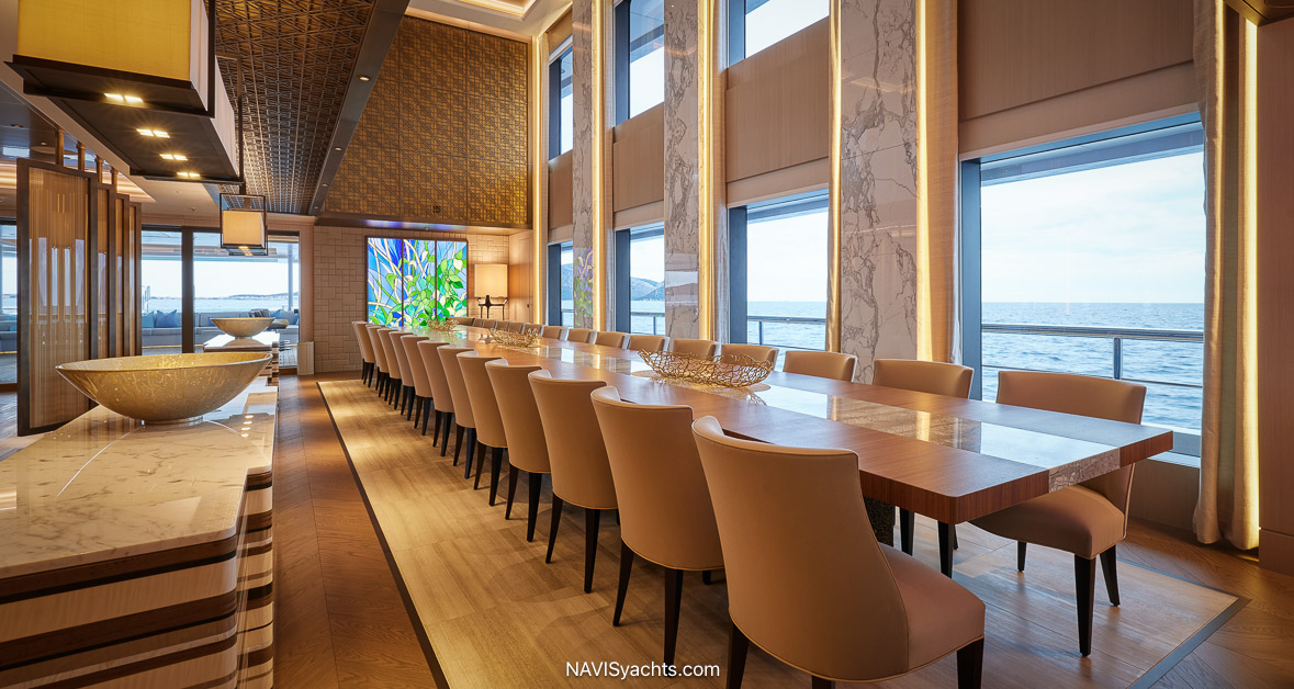 Renaissance yacht main deck atrium dining room with double-height ceiling and marble mullions