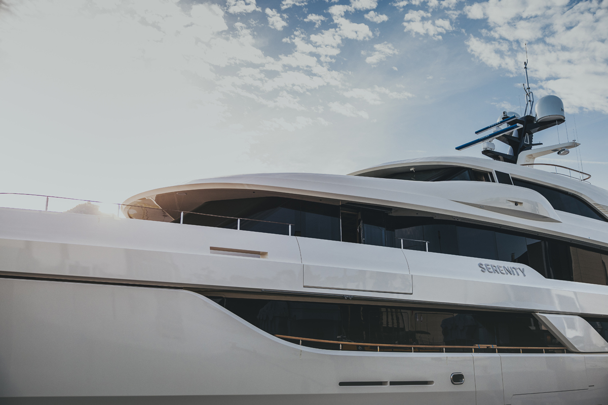 Sleek modern superyacht cruising on open blue waters, showcasing 2026 marine architecture and hybrid propulsion