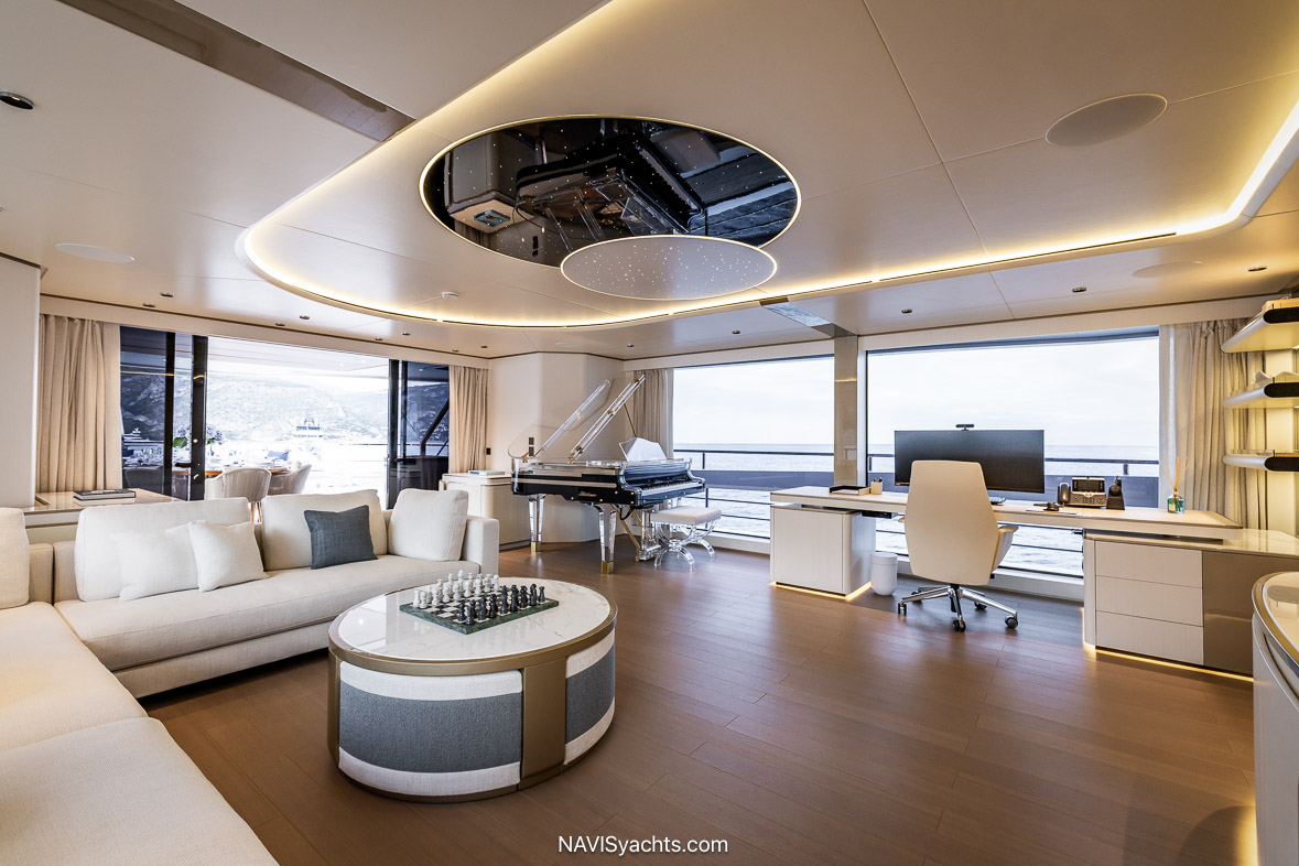 Main salon aboard Mangusta Oceano 50 Felicità featuring contemporary interiors in white and blue