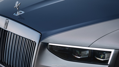 Close-up of Rolls-Royce Ghost Series II illuminated Pantheon grille with signature lighting